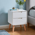 Modern white bedside table with two curved drawers, stylish bedroom furniture by galvorexo, ideal for contemporary bedroom decor.